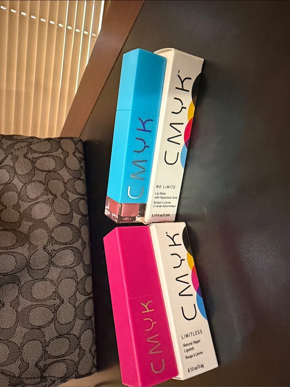 CMYK lip gloss and lipstick